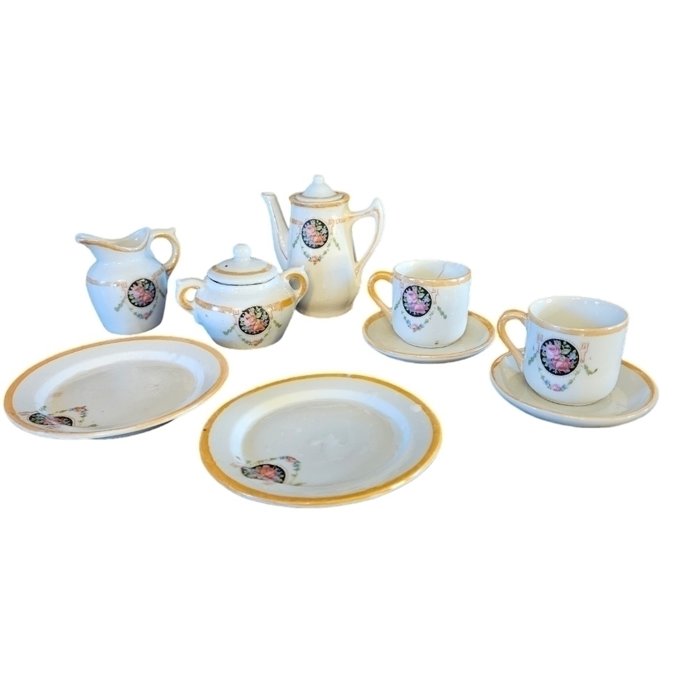 Miniature tea set made in Germany 9 piece set.